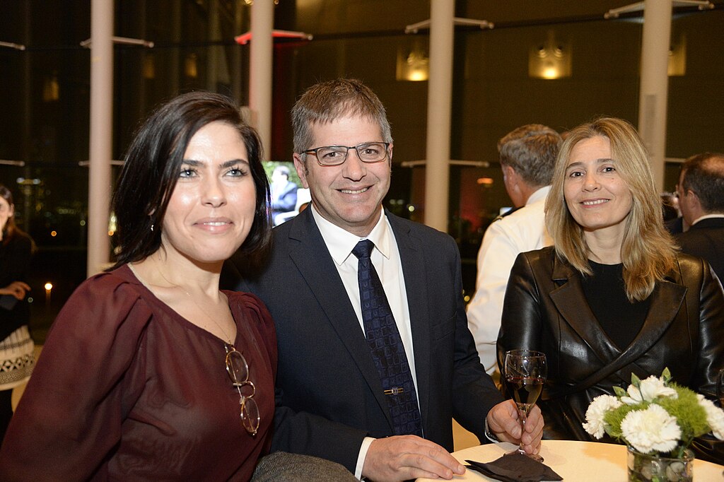 Three colleagues at a business conference